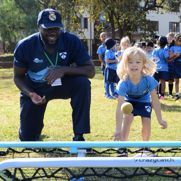 PE teacher and student